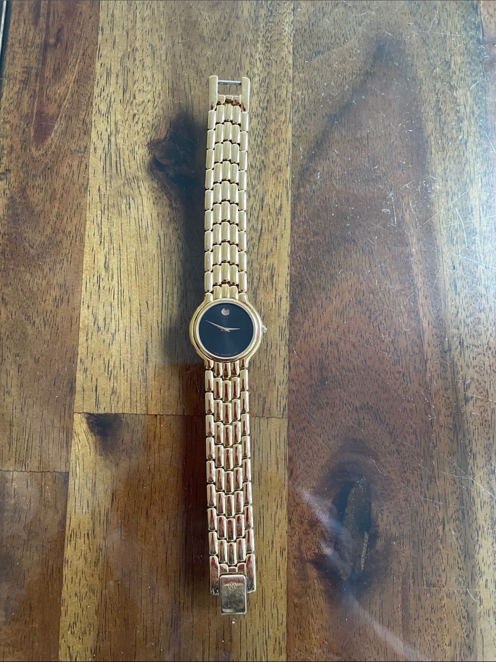 Elegant Gold-Tone Smartwatch with Black Dial. Excellent condition. Like new